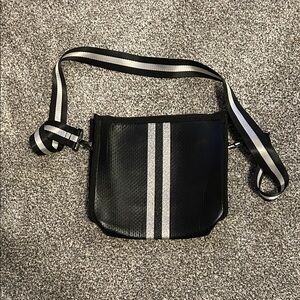 Haute shore black crossbody with metallic silver stripes